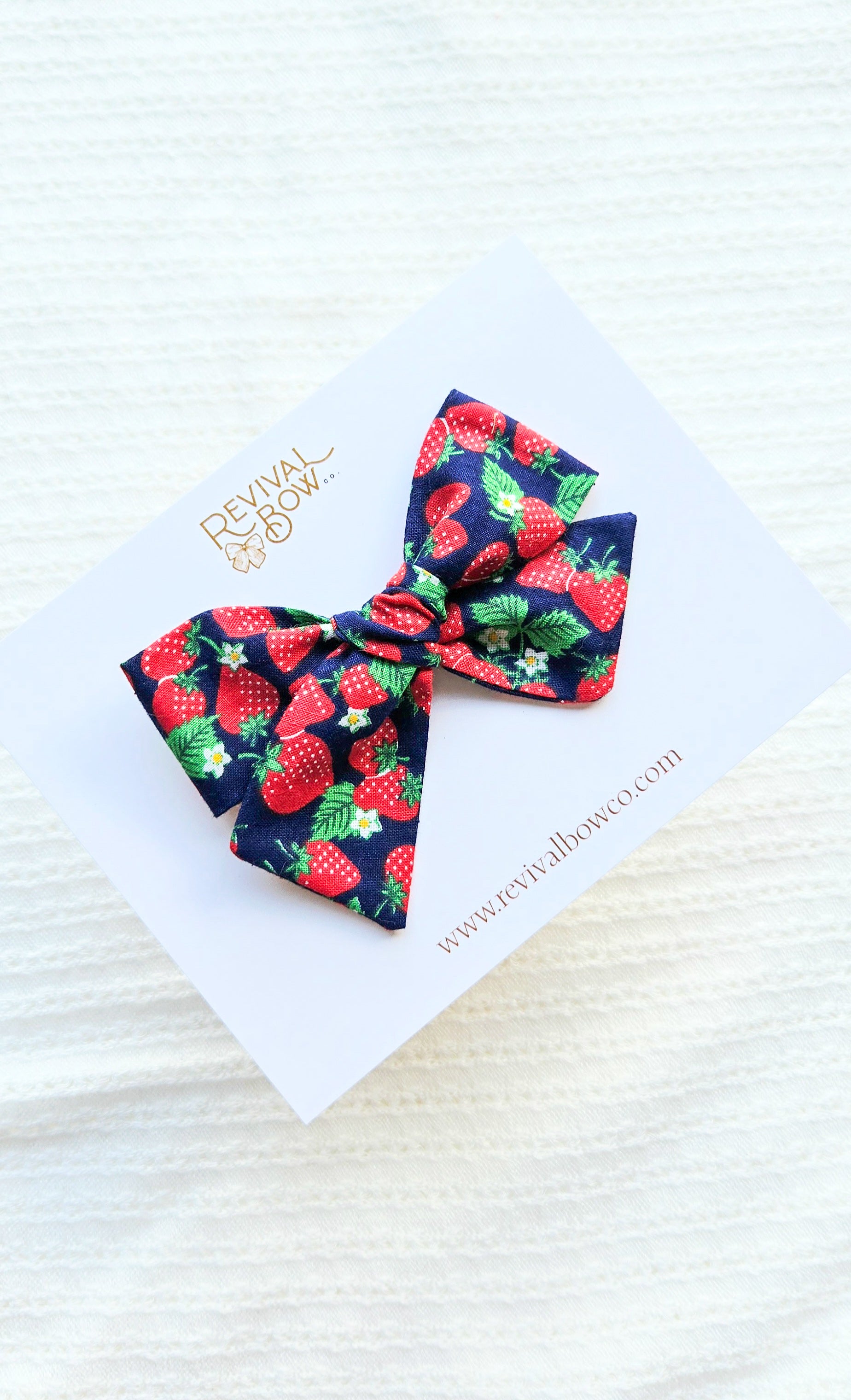 Small Pinwheel Bow • Navy Strawberry