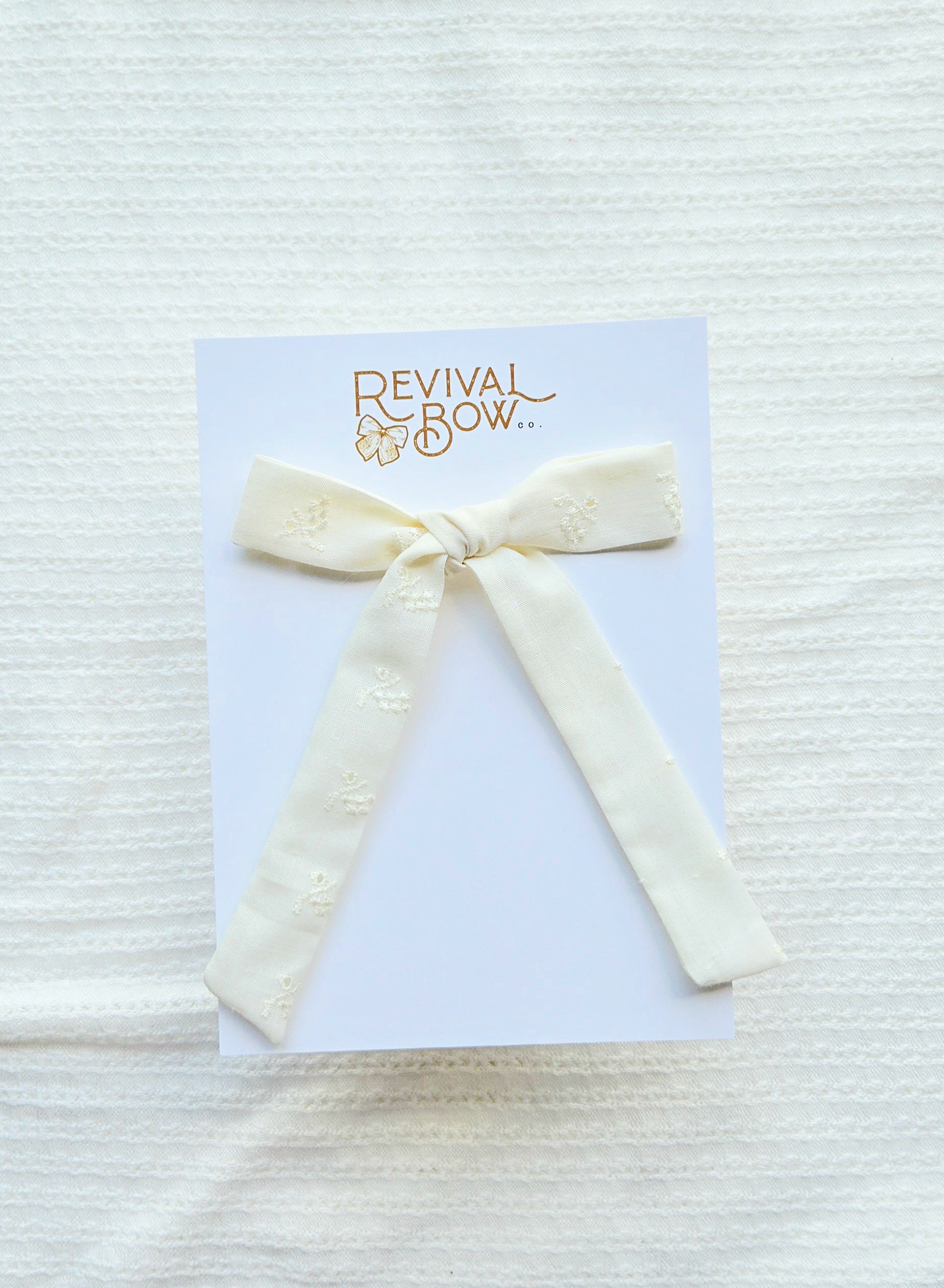 Long Tailed Bow • Ivory Eyelet