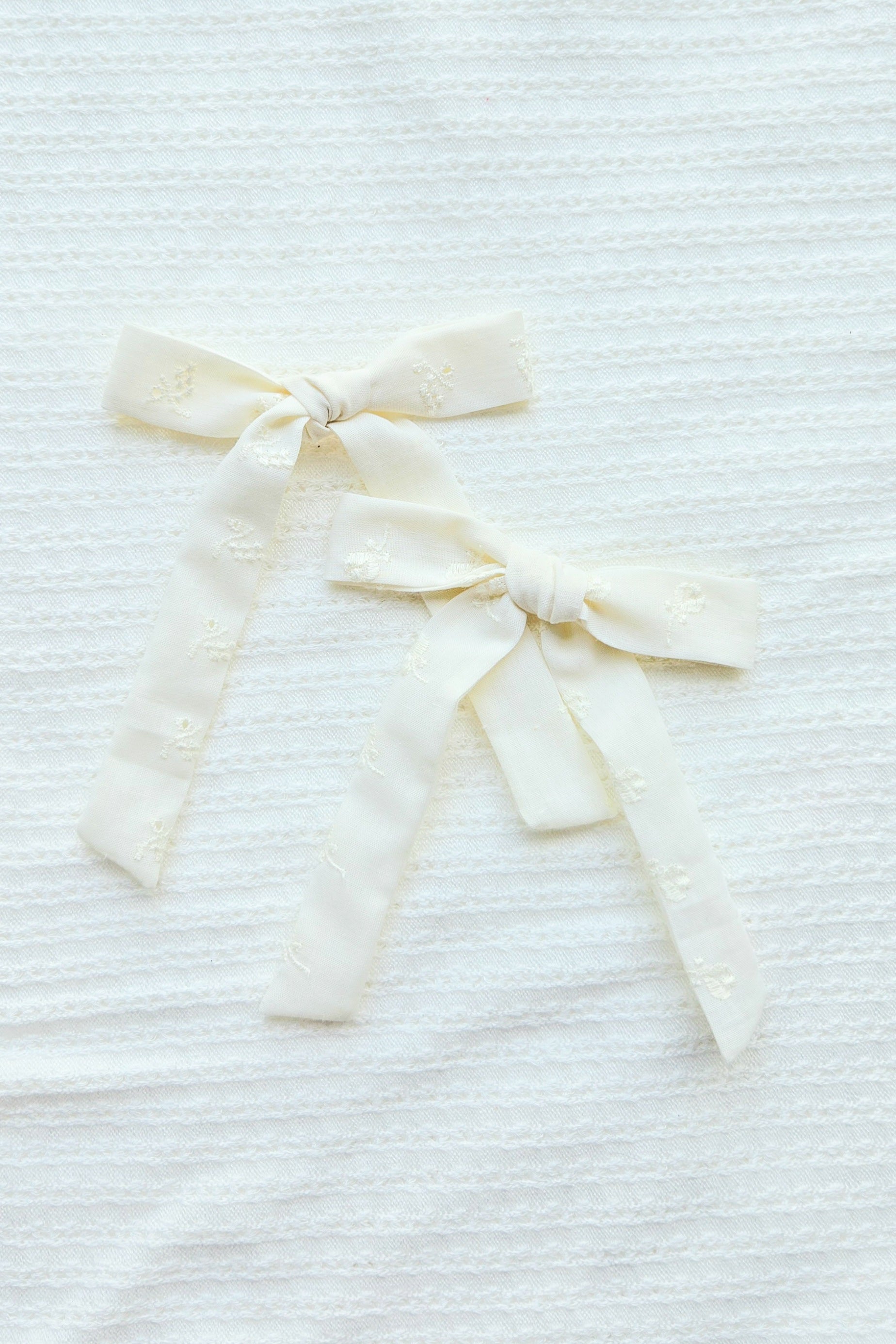 Long Tailed Bow • Ivory Eyelet