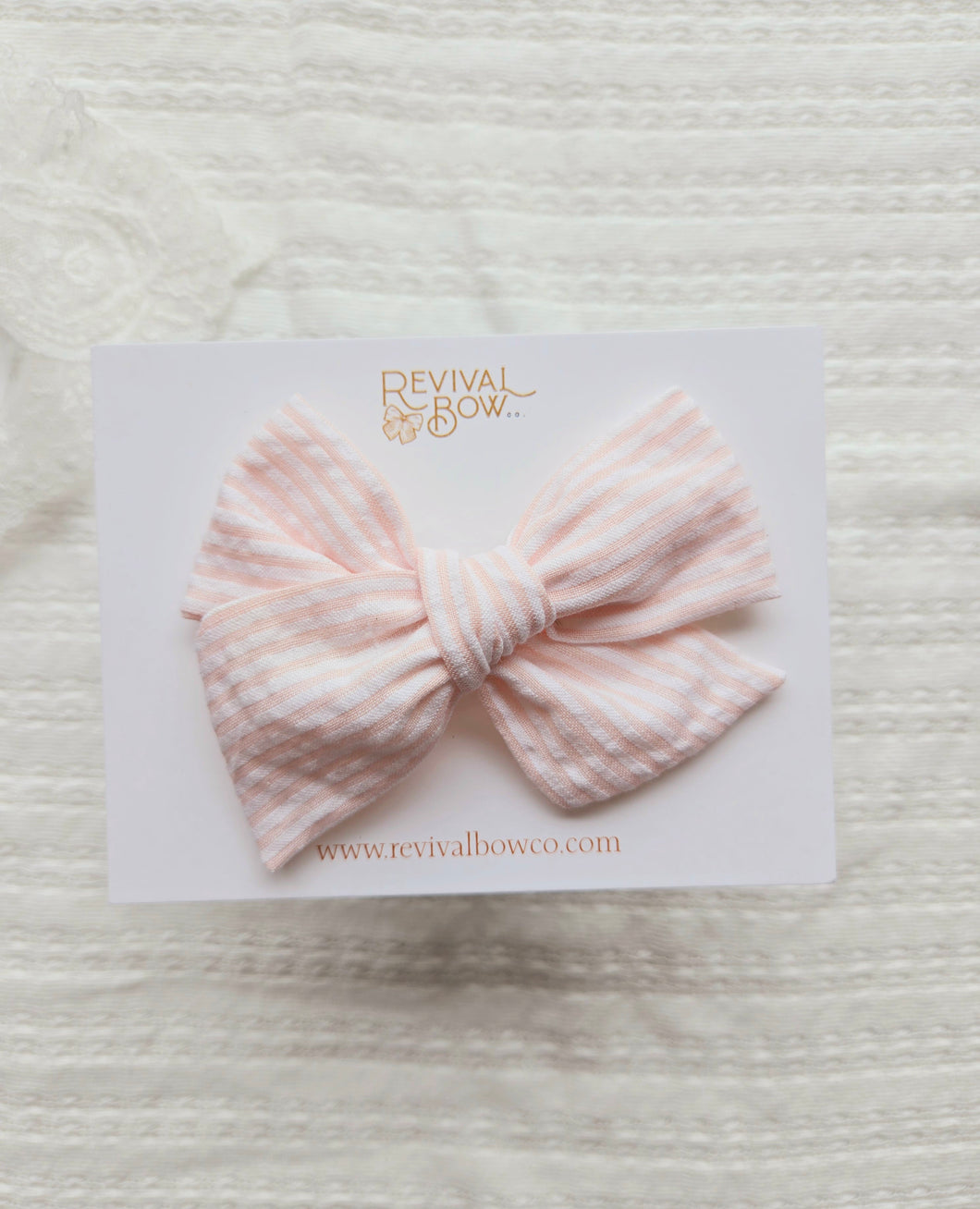 Large Pinwheel Bow • Peachy Pink Stripe