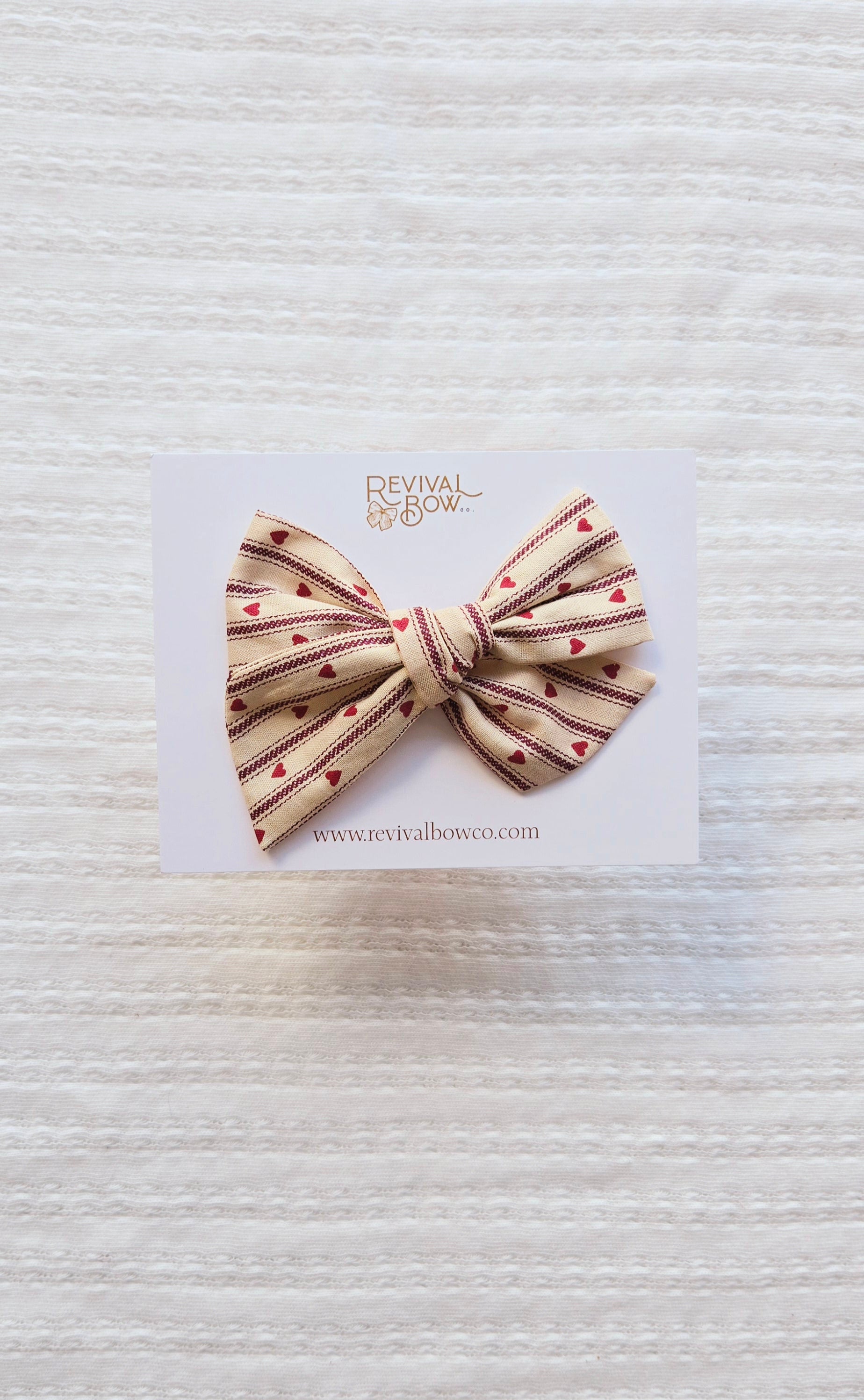 Large Pinwheel Bow • Heart Stripe