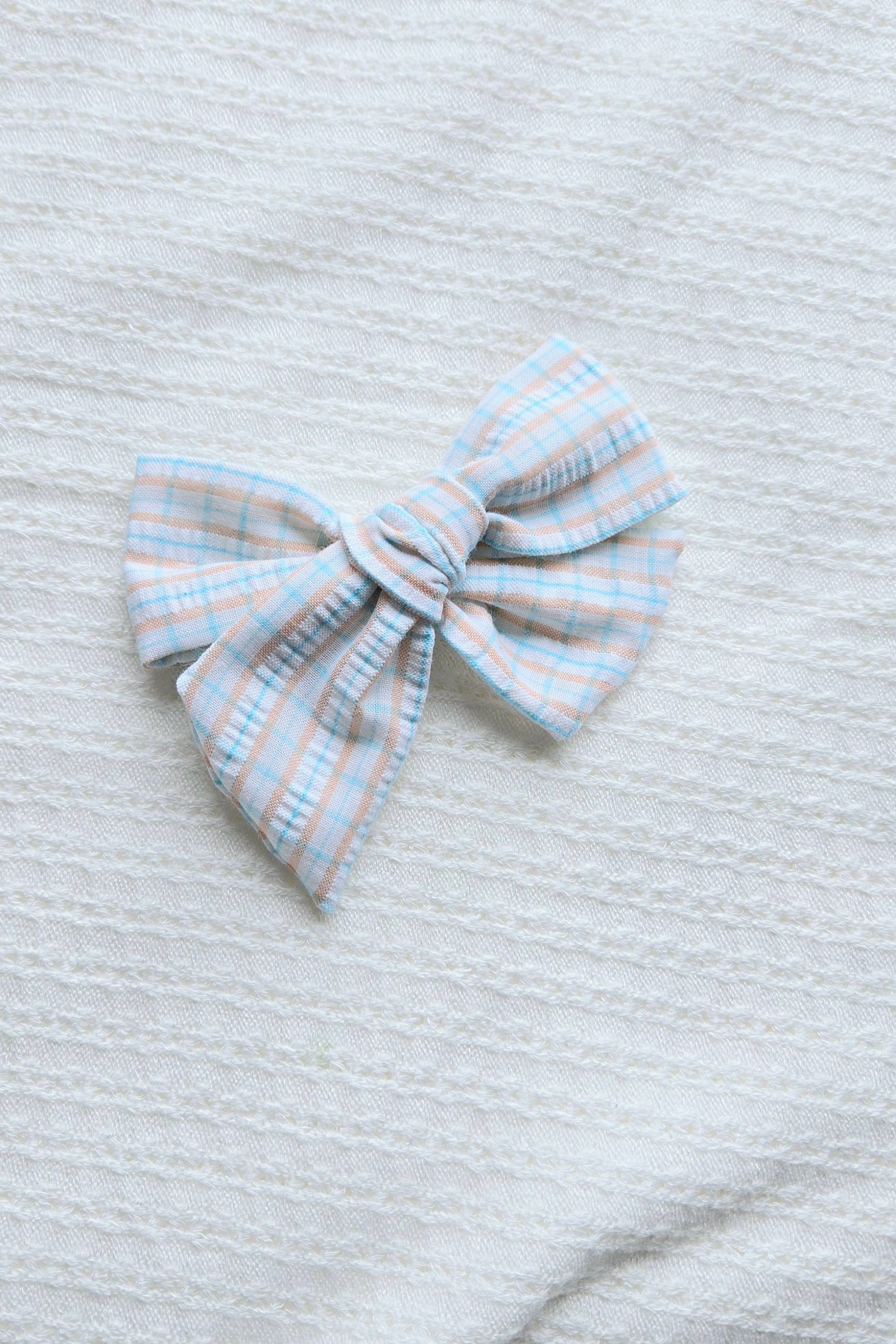 Large Pinwheel Bow • Peach Blue Plaid